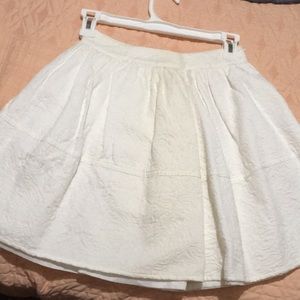 White mini skater skirt